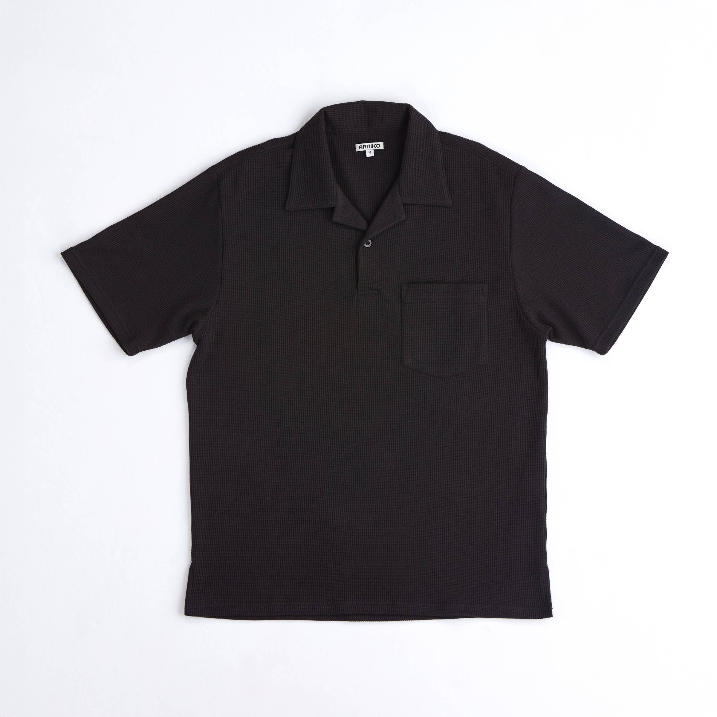 arniko-cricket-polo-schwarz-waffle-baumwolle-herren image 1